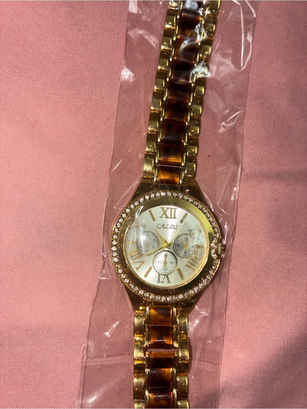 Gold tone and Tortoiseshell  Watch